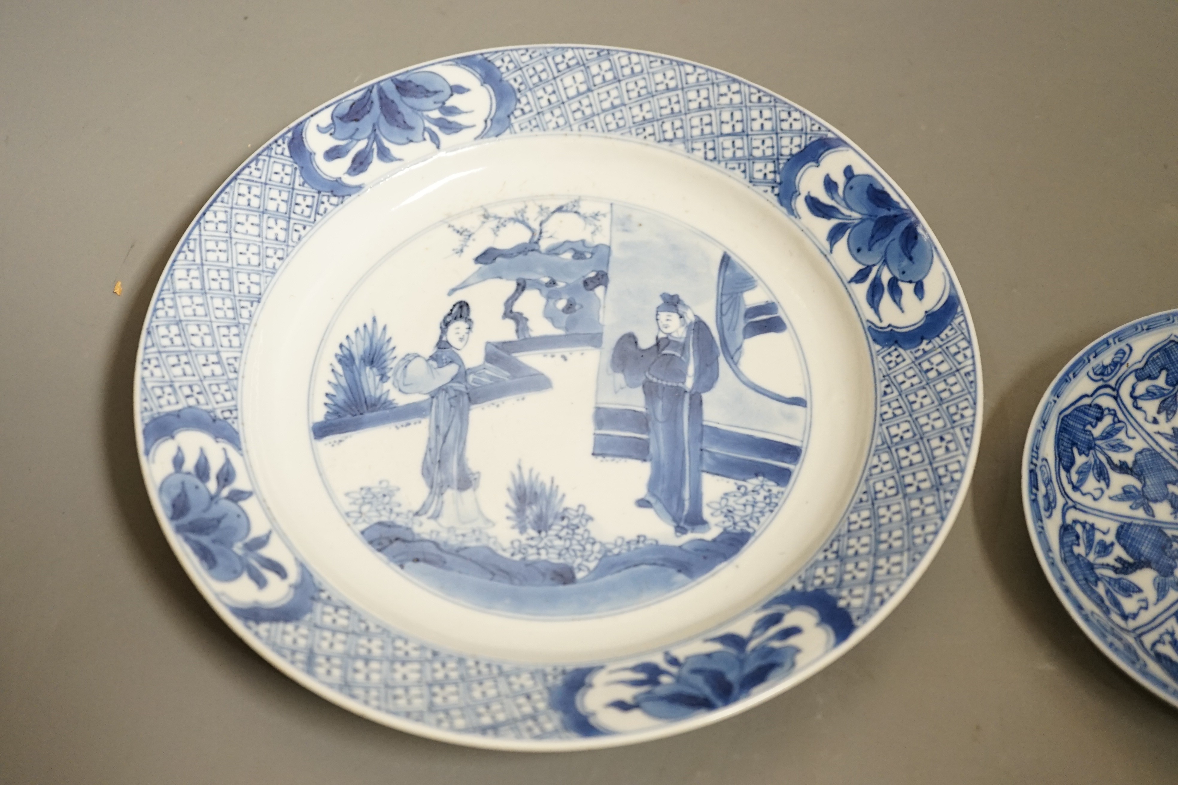 A pair of Chinese dragon dishes, a Kangxi blue and white plate, a Kangxi blue and white dish with chenghua mark